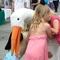 May 9, 2008: Roarke the Stork greets a couple of girls visiting the May-Retta Daze festival on the Marietta town square.
